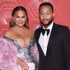 Pregnant Chrissy Teigen Crashes John Legend’s Zoom Interview to Show Off Her Growing Baby Bump: Watch