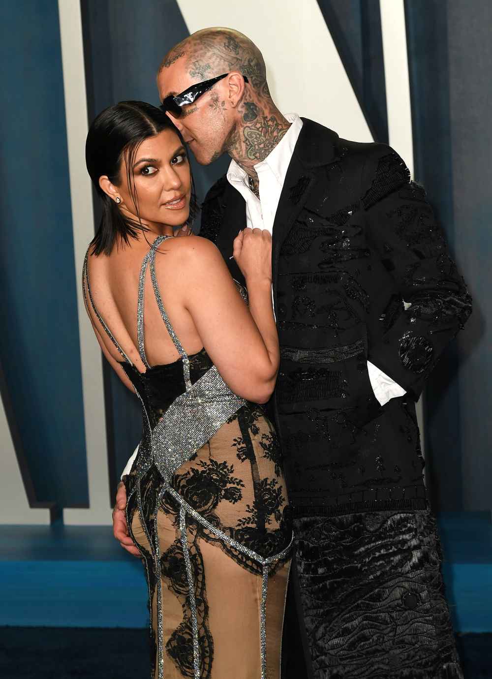 Kourtney Kardashian Is a Proud ‘Tour Wife’ in Backstage PDA Pics With Travis Barker During Machine Gun Kelly’s Concerts