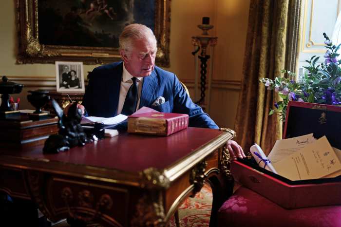 King Charles III Posing with Red Box after accession to the throne: see tribute to Queen Elizabeth II