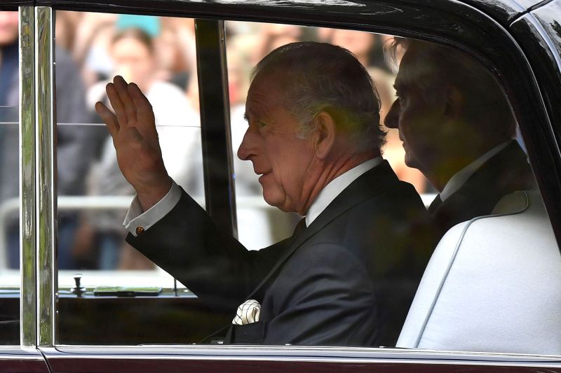 King Charles Waves to Mourners Before Queen Elizabeth II Procession 3
