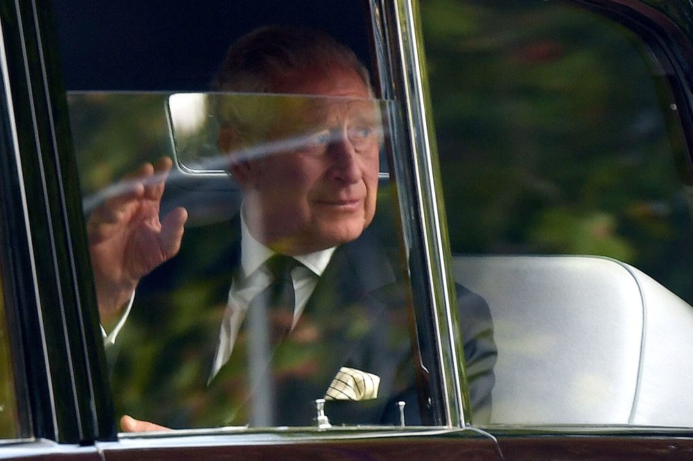 King Charles Waves to Mourners Before Queen Elizabeth II Procession
