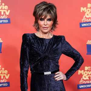 Lisa Rinna Looks Unreal as Flashes Her Best Smize in a Sexy String Bikini