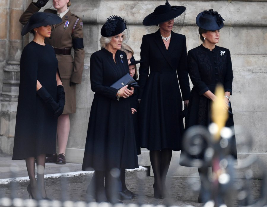 Meghan Markle Hangs Back at Royal Funeral