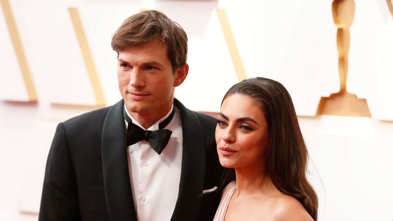 Mila Kunis Reveals How She and Ashton Kutcher Were Able to 'Power Through' His Health Scare: ‘You Just Do’ blush gown