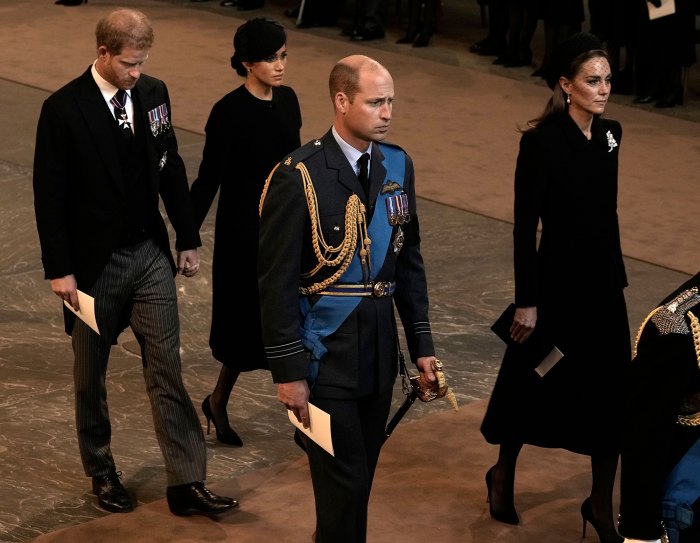 Prince Harry and Meghan Markle Hold Hands As They Exit Queen Elizabeth II’s Westminster Hall Service