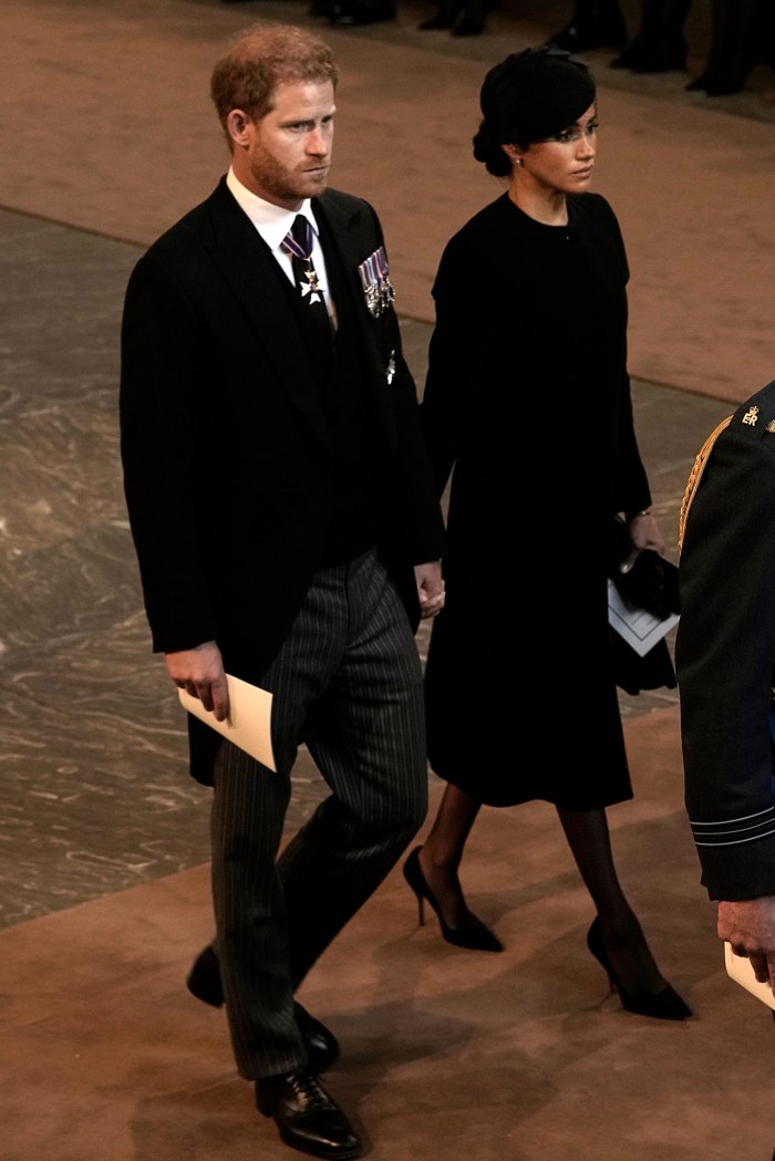 Prince Harry and Meghan Markle Hold Hands As They Exit Queen Elizabeth II’s Westminster Hall Service