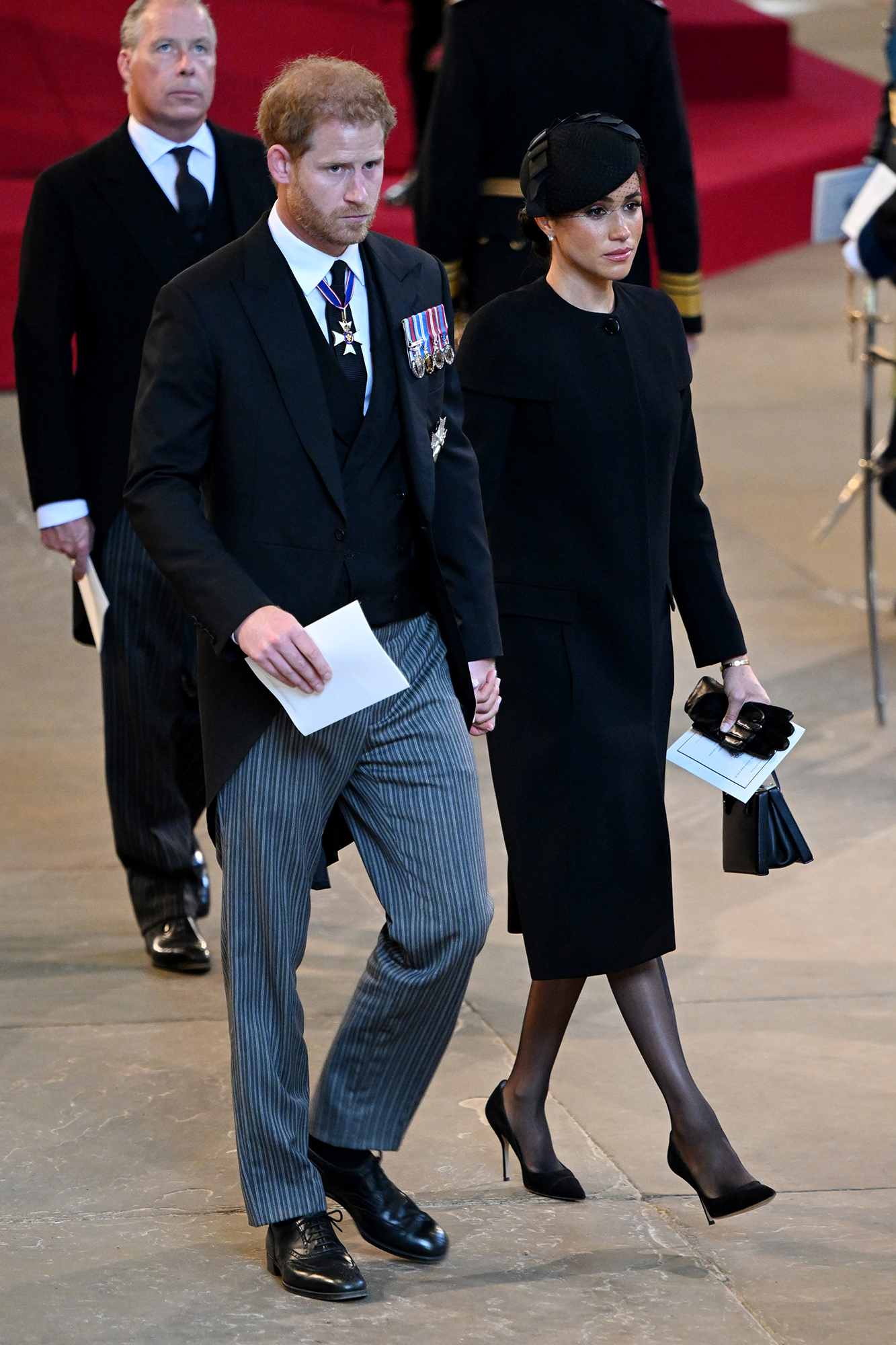 Prince Harry and Meghan Markle Hold Hands As They Exit Queen Elizabeth II’s Westminster Hall Service