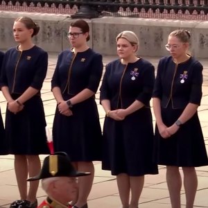 Queen Elizabeth's Staff Line Up to Watch Procession Pass Buckingham Palace