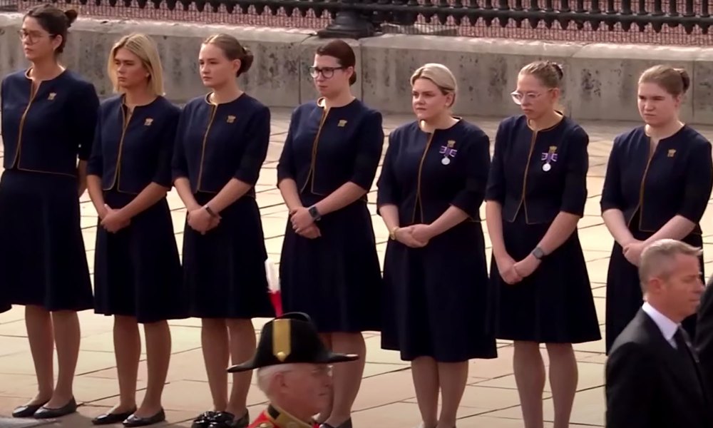 Queen Elizabeth's Staff Line Up to Watch Procession Pass Buckingham Palace