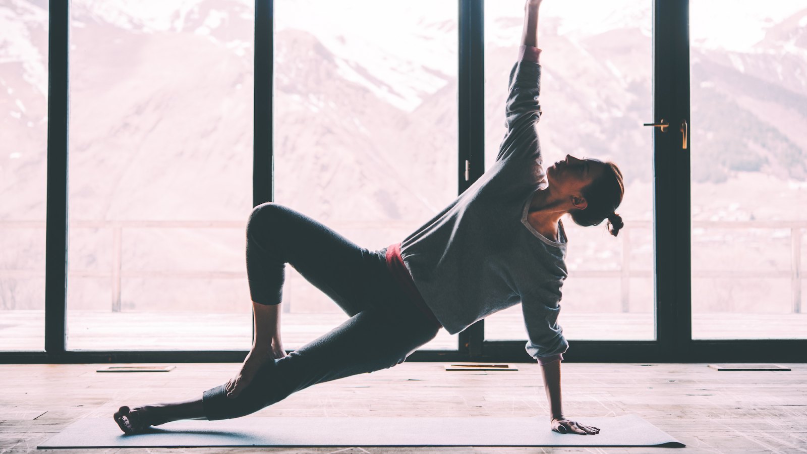 Woman-Practicing-Yoga-Stock-Photo
