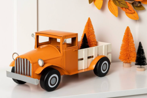 camión de recolección de naranjas