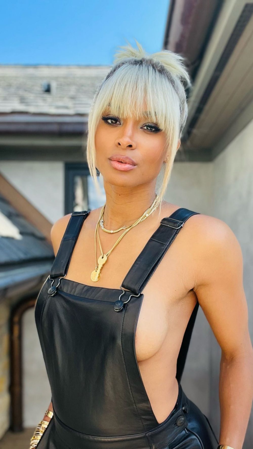 Ciara Poses Topless Underneath Overalls 01