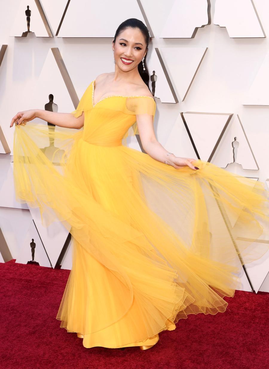 Constance Wu’s Book ‘Making a Scene’ Addresses Rape, Fresh Off the Boat Controversy, Being a Sexual Harasser and More 4 posing at 91st Annual Academy Awards, Arrivals, Los Angeles, USA dancing in a yellow dress