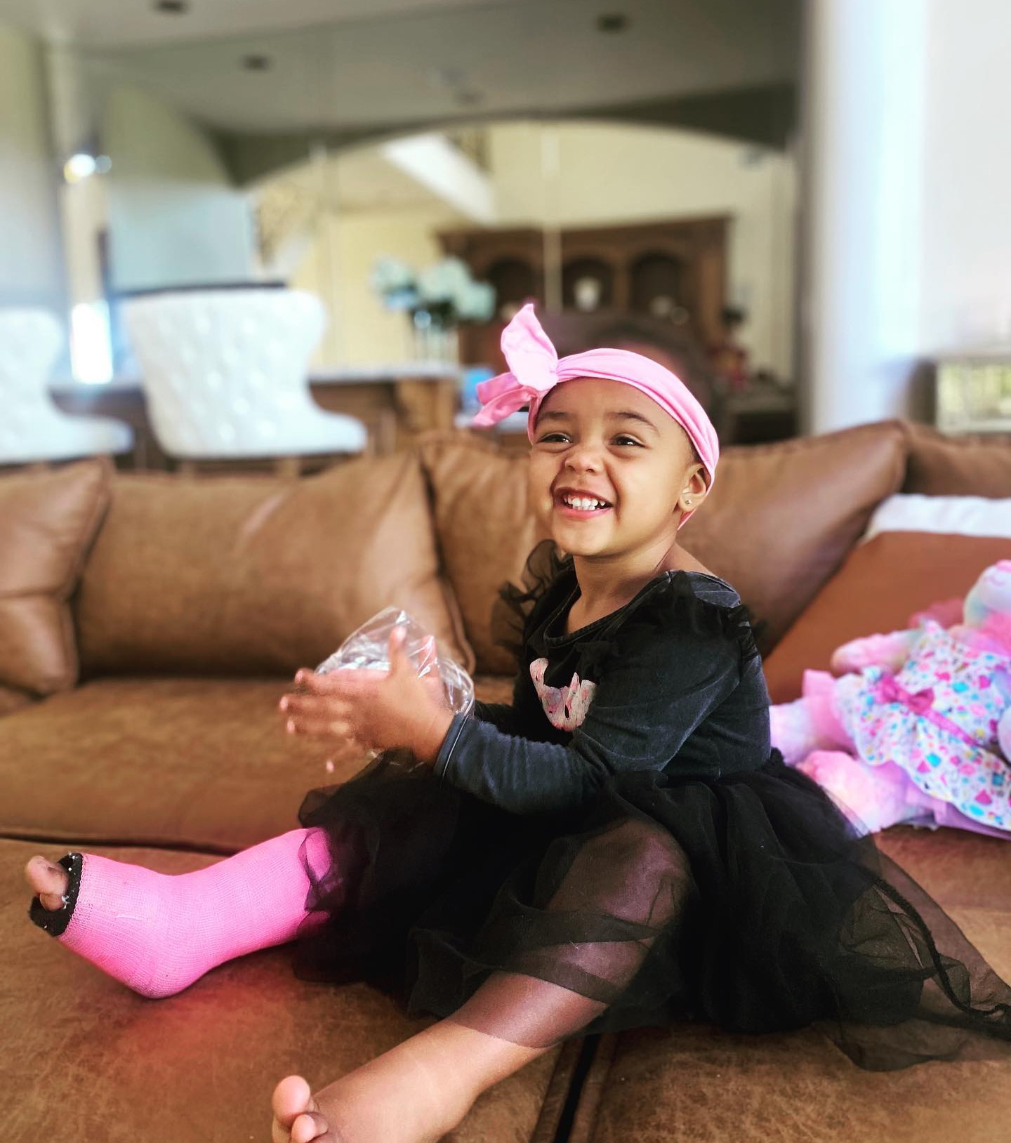 Nick Cannon Bonds With Daughter Halo In Matching Pink Outfits