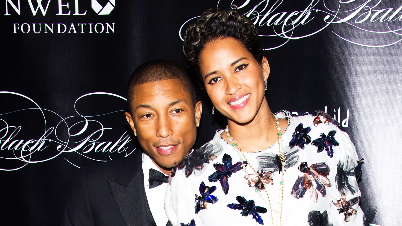 Pharrell Says Wife Helen Lasichanh 'Is Not Mine, But She Sure Makes Me Feel  Like It