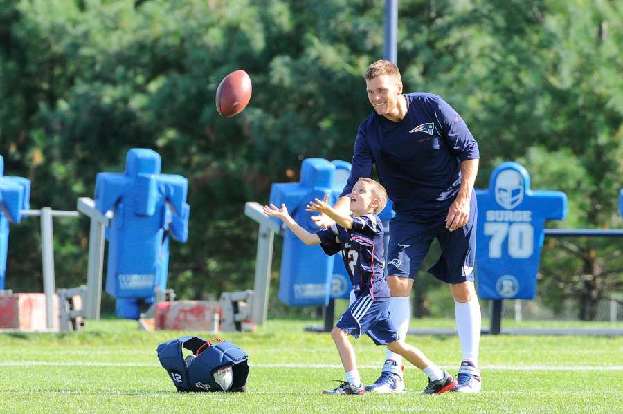 Tom Brady’s Most Honest Quotes About Fatherhood While Raising Kids Jack, Ben and Vivian playing football with son
