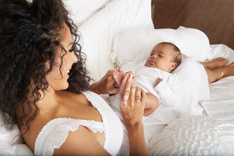 Brittany Bell Poses With Her and Nick Cannon's 3rd Child Rise In Sweet Newborn Portraits