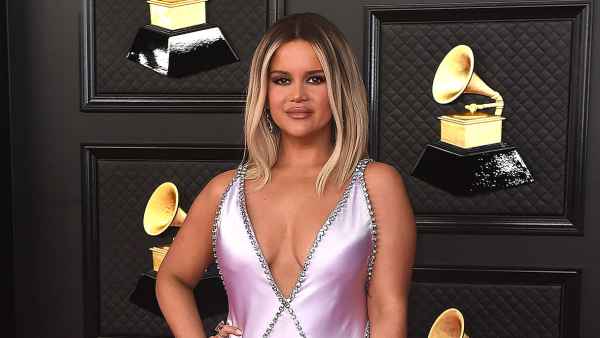 Maren Morris Walks Into 2022 CMAs With Bottle of Champagne