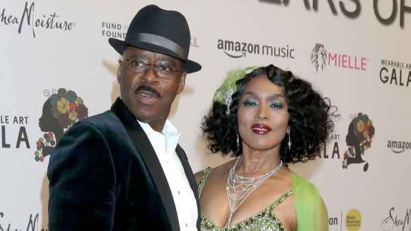 Angela Bassett and Courtney B. Vance green dress