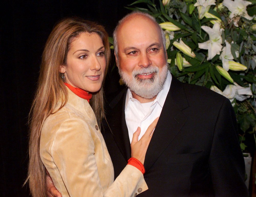 Celine Dion and Rene Angelil's Relationship Timeline - 029 pose in New York, after she was presented a commemorative award by Sony Music