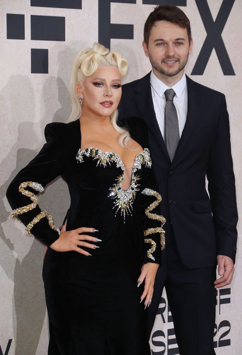 Christina Aguilera and Fiance Matthew Rutler's Relationship Timeline plunging neckline dress