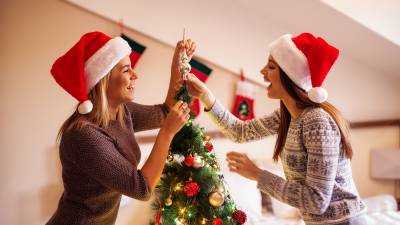 Christmas-Tree-Decorating-Stock-Photo