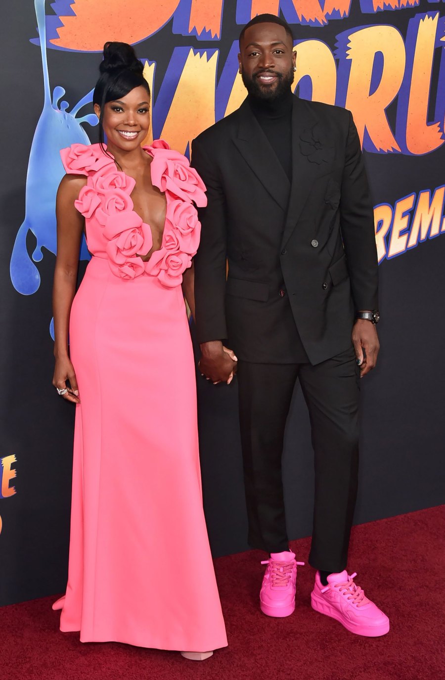 Gabrielle Union and Dwyane Wade’s Best Coordinating Style Moments of All Time bright pink dress and shoes