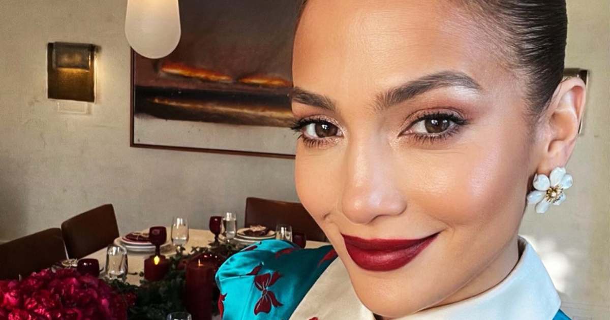 jennifer lopez christmas dress Jennifer Lopez Wears a Body-Hugging Red Dress With Plunging Neckline