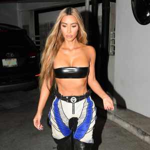 Kim Kardashian Reveals She Just Started Drinking Coffee and Alcohol 1 Year Ago- 'Why Not?' - 523 EXCLUSIVE: Kim Kardashian wearing a tiny bandeau top leaves her hotel with sister Khloe as she heads for dinner at Gekko restaurant in Miami