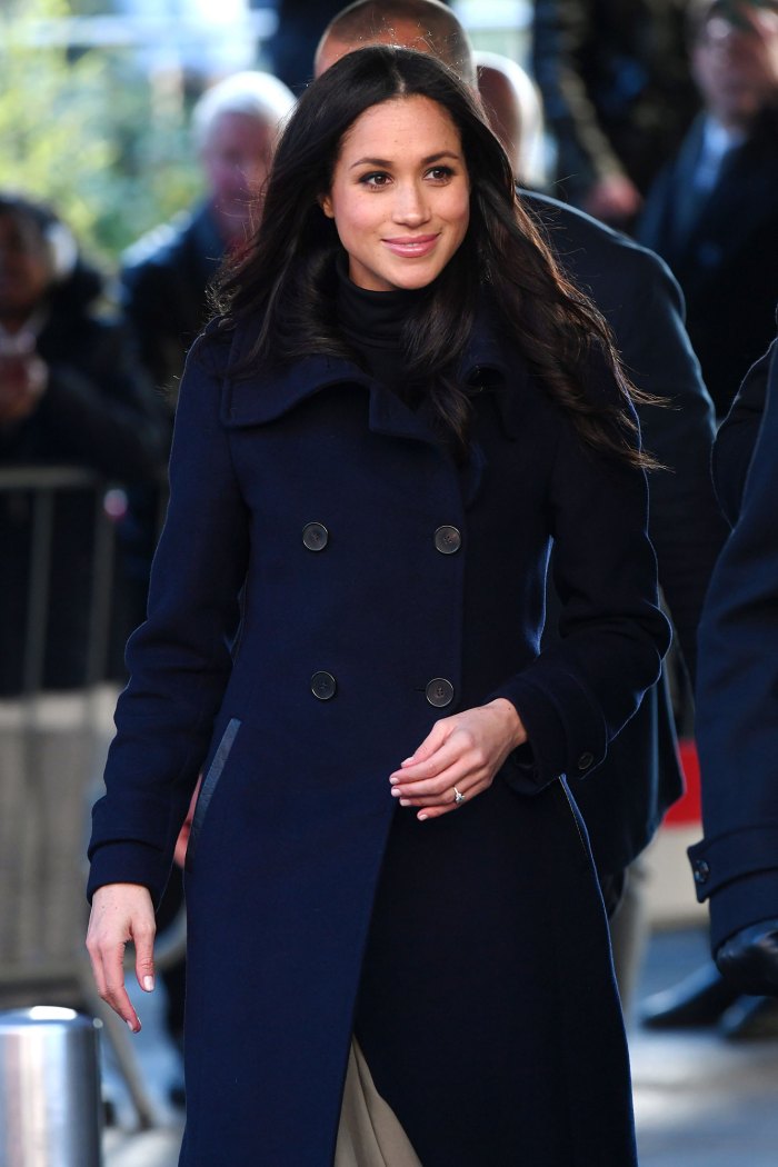 Meghan Markle Compares Learning Royal Protocol to 'Old' Movie 'The Princess Diaries' midnight blue coat