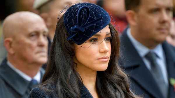 Meghan Markle Talks UK Wardrobe, Says She Wore Dark Colors to Fit in dark blue