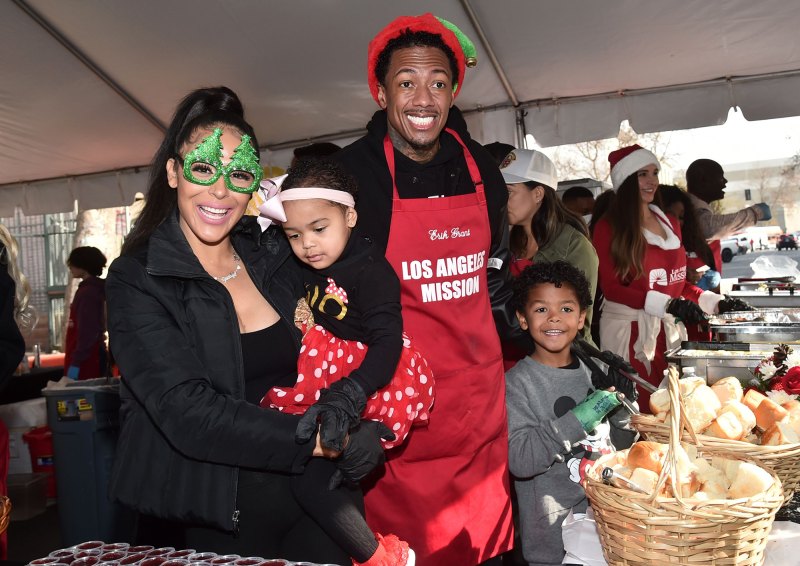 Nick Cannon and Brittany Bell Celebrate Christmas With Their Kids While Feeding the Homeless 03