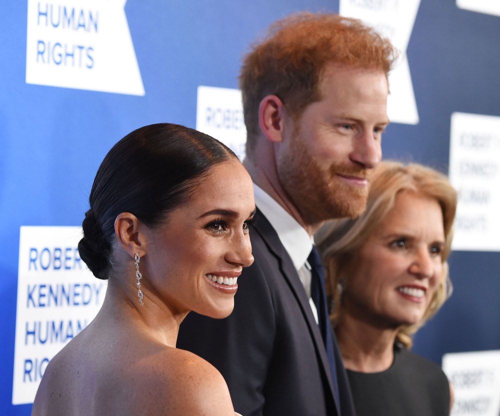 Prince Harry Reveals Royal Family Thought Meghan Markle Was Going Through a ‘Rite of Passage’ With the U.K. Press: 'Why Should She Be Protected?' side view