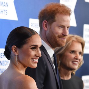Prince Harry Reveals Royal Family Thought Meghan Markle Was Going Through a ‘Rite of Passage’ With the U.K. Press: 'Why Should She Be Protected?' side view