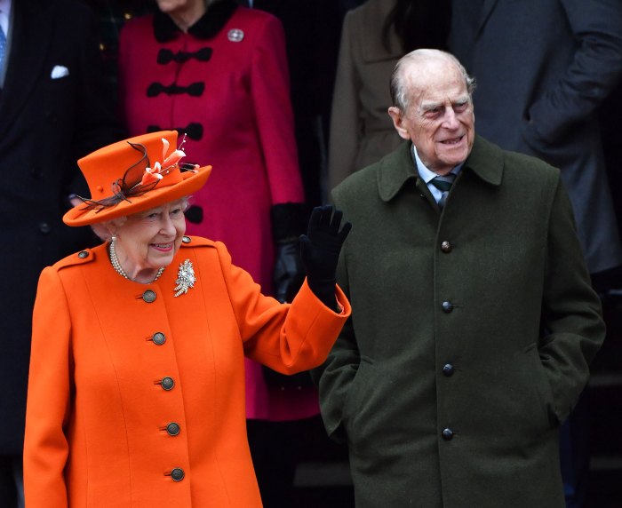 Prince Philip Couldn't Hear Meghan Markle at 1st Christmas With Royals: She Had His 'Bad Ear' orange coat