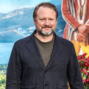 Rian Johnson Reveals Why He Is 'Pissed Off‘ About the Title for 'Knives Out' Sequel 'Glass Onion‘ sweater under blazer