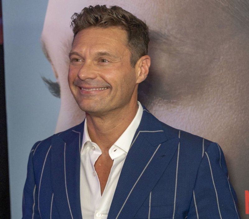Ryan Seacrest Recalls NYE Mishap Where Taylor Swift Ended Up With His Equipment wide stripe suit