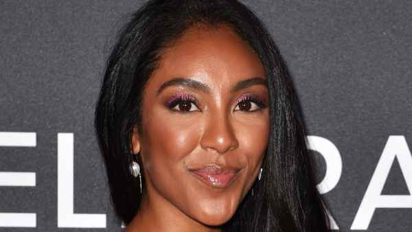 Tayshia Adams Creates Crossbody ‘All Things Possible’ Purse for Ukraine Relief
