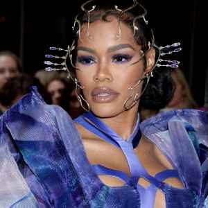 Teyana Taylor's Dermatologist Talks Xeomin, When to Start Injectables and Why She's Against DIY Skincare blue chiffon dress