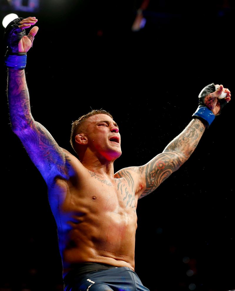 UFC Fighter Dustin Poirier: 25 Things You Don’t Know About Me (I Was Most Star Struck Meeting Mike Tyson!) victory pose
