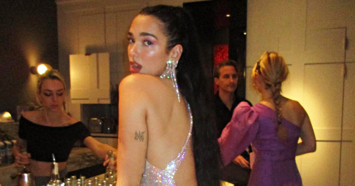 Dua Lipa Flashes Thong in Backless Dress on New Year's Eve: Pic | Us Weekly Dua Lipa Flashes Thong in Backless Dress on New Year's Eve: Pic | Us Weekly