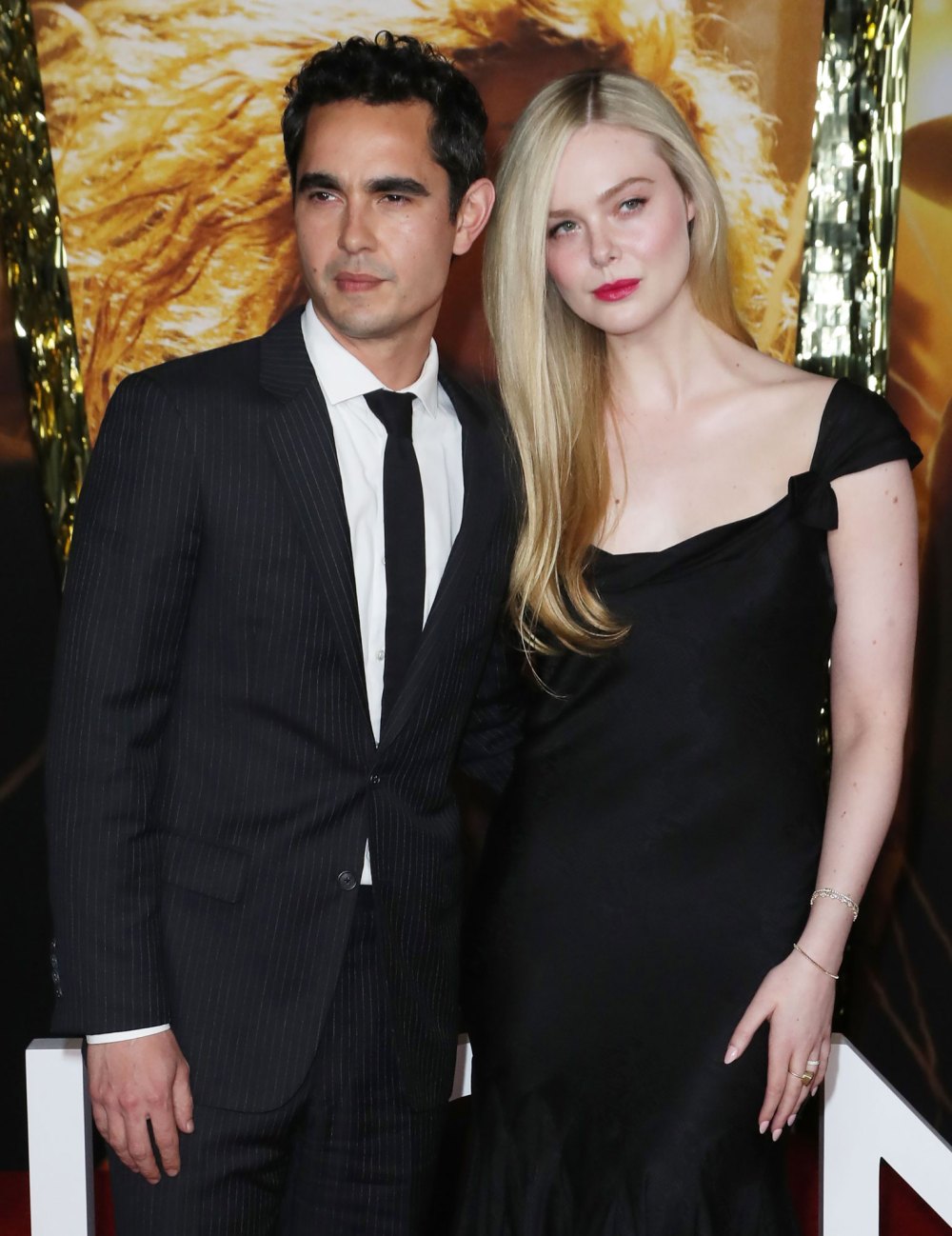Elle Fanning and Max Minghella Have Been 'Serious' for a While, Age Difference 'Isn't an Issue': 'They're Super Solid' thin black tie