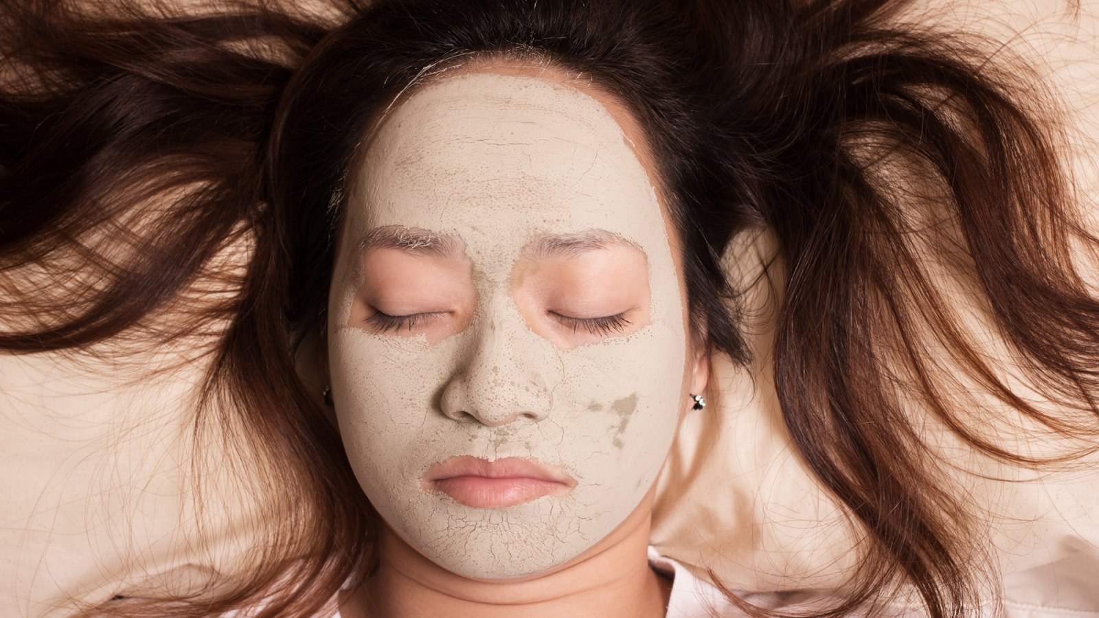 Face-Mask-In-Bed-Stock-Photo