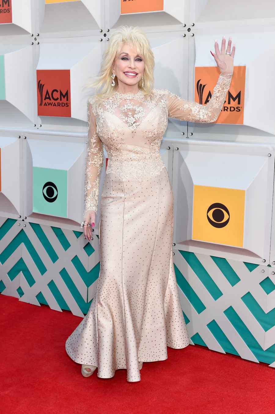 Dolly Parton's Best Red Carpet Moments Through Her Life