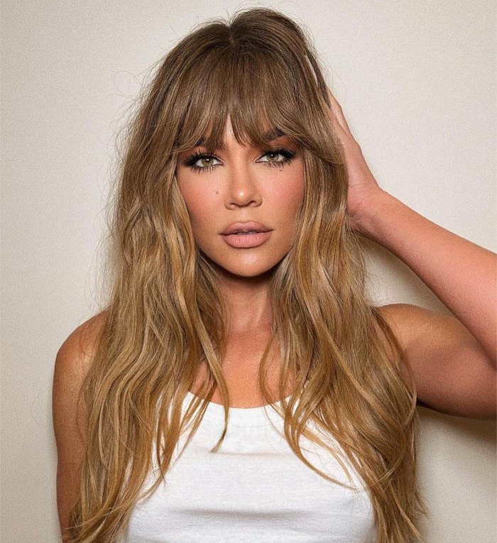 Khloe Kardashian Claps Back at Fan Who Implies Her Clip On Bangs Arent All Shes Changed on Her Face ‘Attacking Someone Is Sad 691