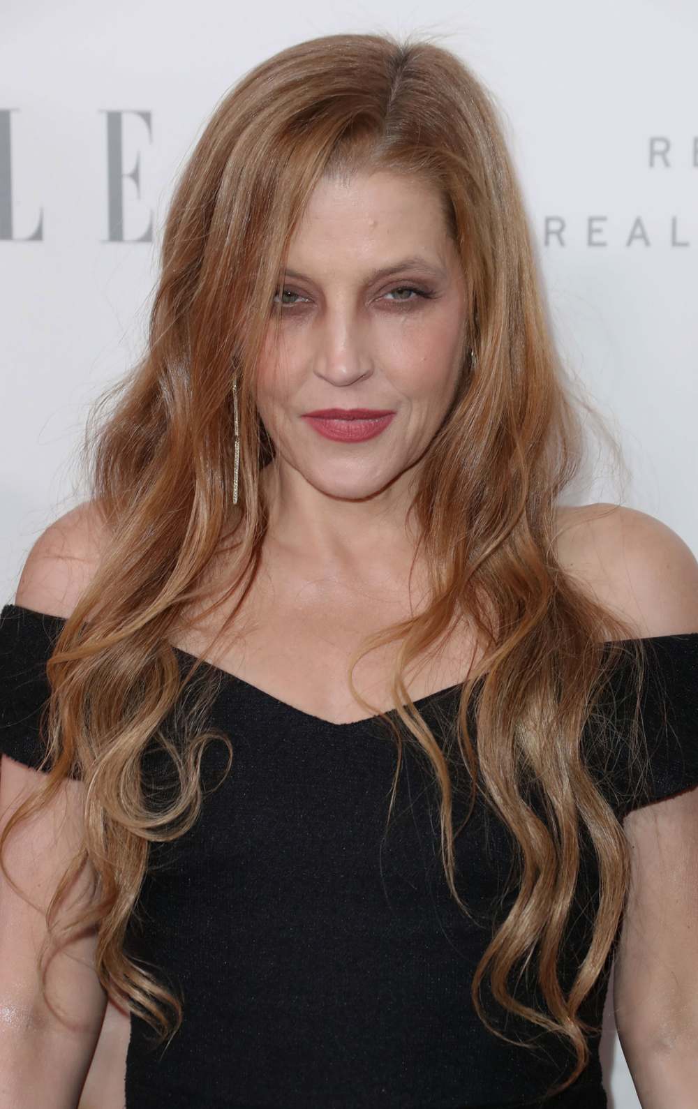 Lisa Marie Presley to Be Laid to Rest at Graceland Alongside Father Elvis Presley black dress 2017