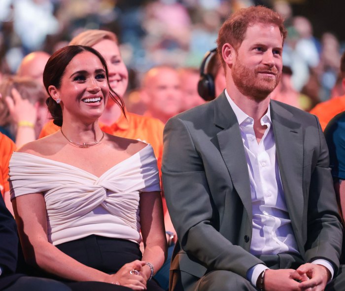 Prince Harry Recalls How Meghan Markle Asked for 'Guidance' From Princess Diana's Grave Amid U.K. Press Scrutiny green hat and dress white off the shoulder dress