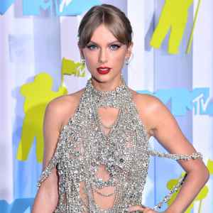 reaking Down all the Easter Eggs in Taylor Swift's 'Lavender Haze' Music Video silver dress