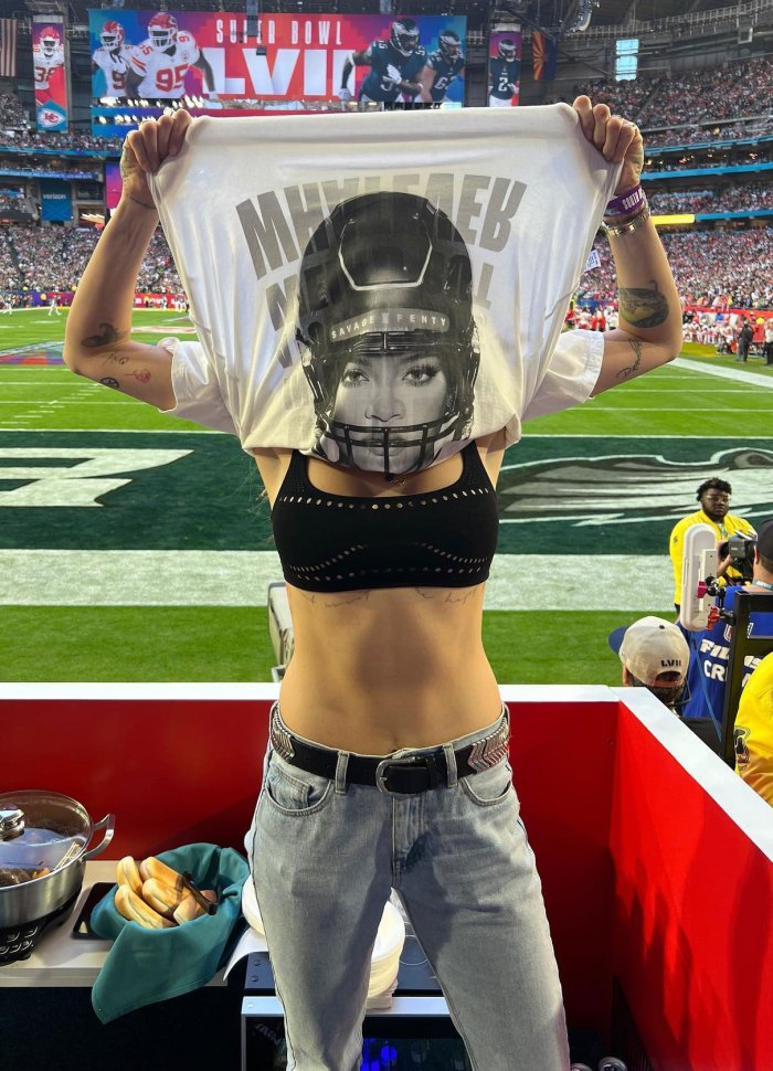Cara D Wears Team Rihanna Shirt at Super Bowl bra