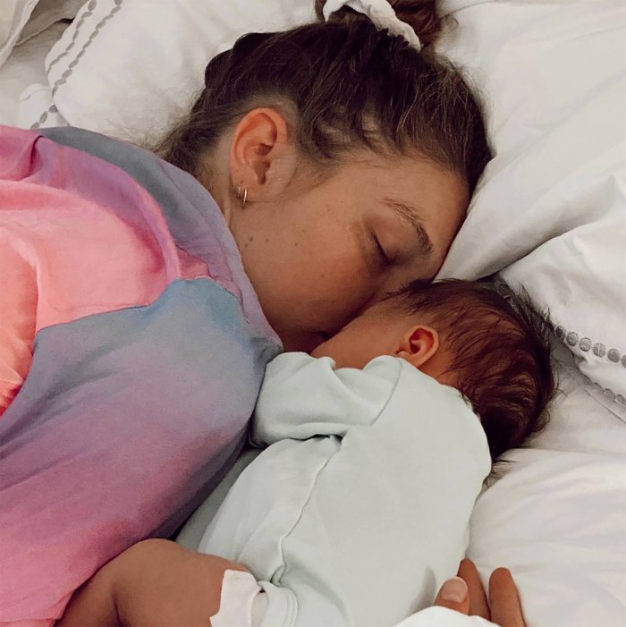 Gigi Hadid Says Raising Daughter Khai Has Made Her 'Want to Feel More Settled': Motherhood 'Shifted My Life' pink blue jacket